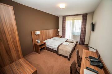 Фото номера Двухместный номер с 1 кроватью или 2 отдельными кроватями Отель Hotel Zawrat Ski Resort &amp; SPA г. Бялка-Татшаньска 7