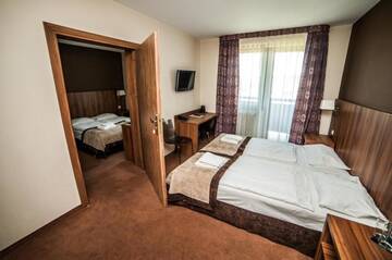 Фото номера Номер-студио (4 взрослых) Отель Hotel Zawrat Ski Resort &amp; SPA г. Бялка-Татшаньска 2