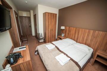 Фото номера Номер-студио (4 взрослых) Отель Hotel Zawrat Ski Resort &amp; SPA г. Бялка-Татшаньска 4