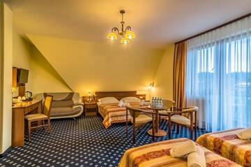 Фото номера Четырехместный номер Отель Hotel Liptakówka г. Бялка-Татшаньска 8