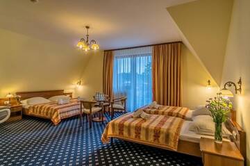 Фото номера Четырехместный номер Отель Hotel Liptakówka г. Бялка-Татшаньска 9