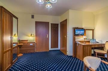 Фото номера Четырехместный номер Отель Hotel Liptakówka г. Бялка-Татшаньска 6