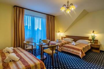 Фото номера Четырехместный номер Отель Hotel Liptakówka г. Бялка-Татшаньска 7
