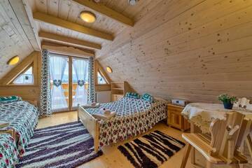 Фото номера Дом с 2 спальнями Шале Domek w Białce г. Бялка-Татшаньска 69