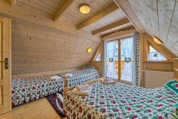 Фото номера Дом с 2 спальнями Шале Domek w Białce г. Бялка-Татшаньска 70