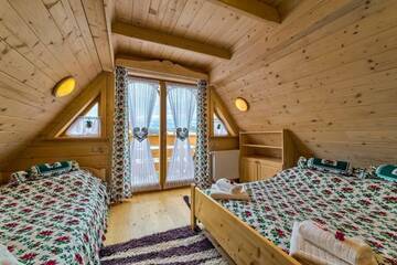 Фото номера Дом с 2 спальнями Шале Domek w Białce г. Бялка-Татшаньска 68
