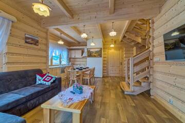 Фото номера Дом с 2 спальнями Шале Domek w Białce г. Бялка-Татшаньска 25