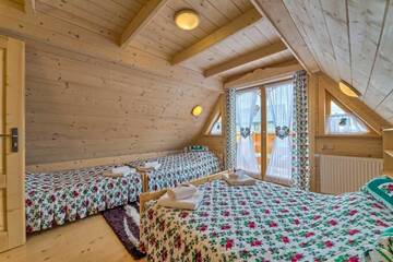 Фото номера Дом с 2 спальнями Шале Domek w Białce г. Бялка-Татшаньска 33