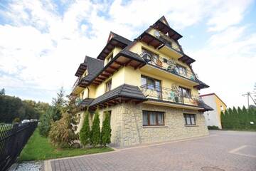 Фото номера Апартаменты с 2 спальнями Апартаменты Apartament Cztery Pory Roku г. Бялка-Татшаньска 16