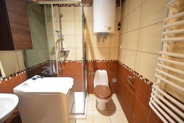 Фото номера Апартаменты с 2 спальнями Апартаменты Apartament Cztery Pory Roku г. Бялка-Татшаньска 25