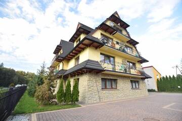 Фото номера Апартаменты с 2 спальнями Апартаменты Apartament Cztery Pory Roku г. Бялка-Татшаньска 22