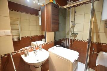 Фото номера Апартаменты с 2 спальнями Апартаменты Apartament Cztery Pory Roku г. Бялка-Татшаньска 24