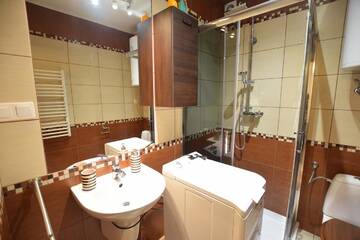 Фото номера Апартаменты с 2 спальнями Апартаменты Apartament Cztery Pory Roku г. Бялка-Татшаньска 9