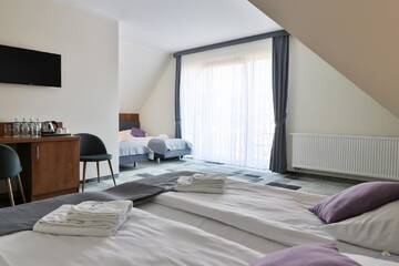 Фото номера Стандартный четырехместный номер Отель Hotel Bystra г. Бялка-Татшаньска 2