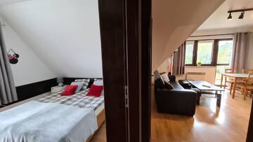 Фото номера Апартаменты Делюкс с 2 спальнями и камином Апартаменты Apartamenty Bajka Białka Tatrzanska z Kuchnią г. Бялка-Татшаньска 6