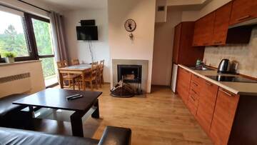 Фото номера Апартаменты Делюкс с 2 спальнями и камином Апартаменты Apartamenty Bajka Białka Tatrzanska z Kuchnią г. Бялка-Татшаньска 7