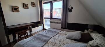 Фото номера Апартаменты Делюкс с 2 спальнями и камином Апартаменты Apartamenty Bajka Białka Tatrzanska z Kuchnią г. Бялка-Татшаньска 12