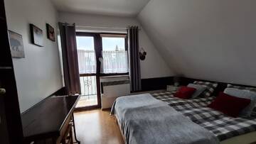 Фото номера Апартаменты Делюкс с 2 спальнями и камином Апартаменты Apartamenty Bajka Białka Tatrzanska z Kuchnią г. Бялка-Татшаньска 5